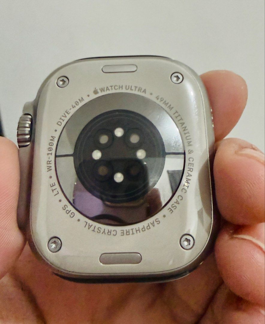 Apple Watch Ultra 1 (Category: Wearables & Smart Watches) located in Manila. Submitted by evildogchihuahua0701 (Listing ID 1470919910, Image 2). Description: - Brand: Apple Watch Ultra 1 - Case: 49mm Titanium & Ceramic Case with Sapphire Crystal - Storage: 32GB capacity - Battery Health: 99% maximum capacity - Condition: Excellent, well-maintained - Meetup Location: Gateway Mall, Araneta City, Quezon City -face protector/tempered glass installed.