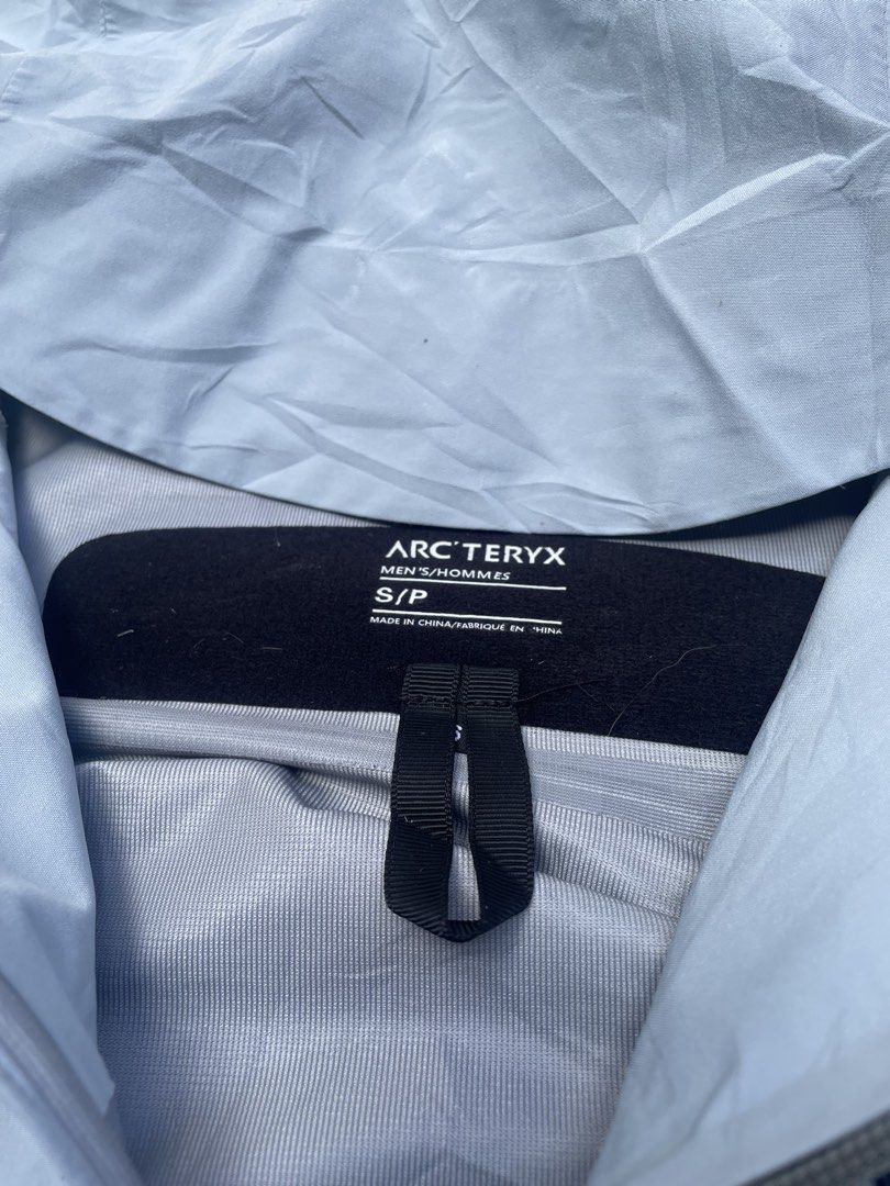 Arc'teryx Beta LT Jacket Light Blue Men's Size S (Category: Coats, Jackets and Outerwear) located in Caloocan City. Submitted by robincedri55369 (Listing ID 1470851194, Image 3). Description: - Brand: Arc'teryx - Model: Beta LT Jacket - Color: Light Blue - Size: Men's Small (Tag Code: 30165-134387) - Material: GORE-TEX waterproof fabric - Features: Full front zip, adjustable drawcord hood, underarm pit zips for ventilation, and two zipped hand po