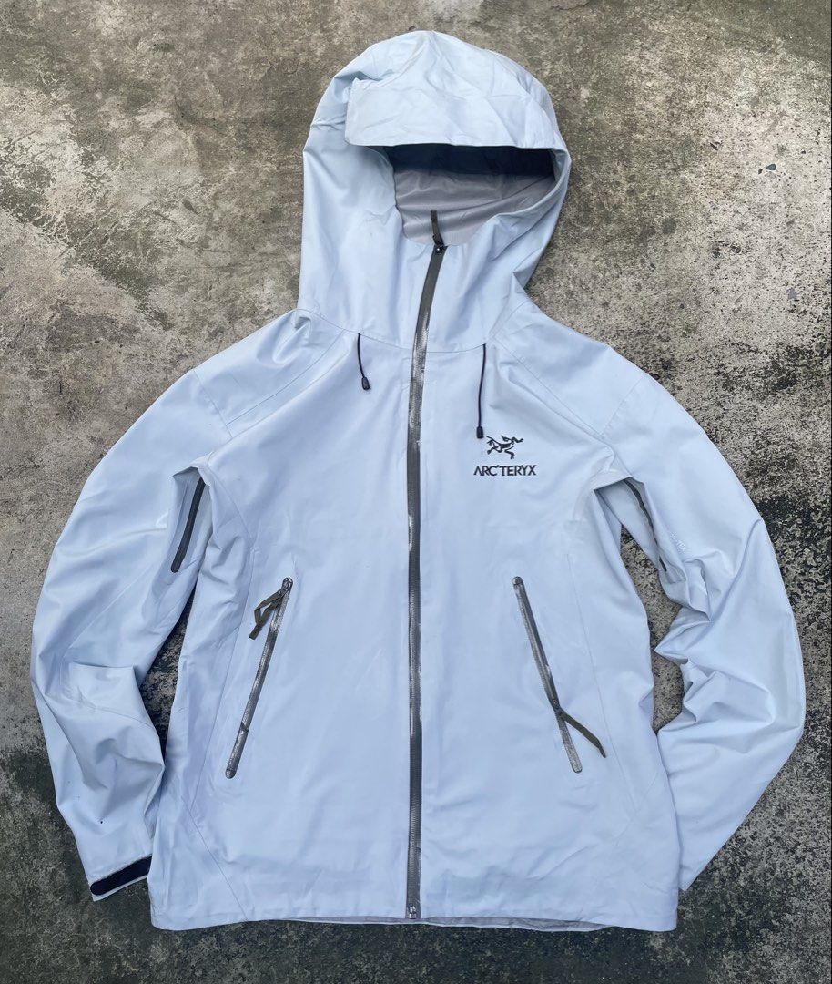 Arc'teryx Beta LT Jacket Light Blue Men's Size S (Category: Coats, Jackets and Outerwear) located in Caloocan City. Submitted by robincedri55369 (Listing ID 1470851194, Image 1). Description: - Brand: Arc'teryx - Model: Beta LT Jacket - Color: Light Blue - Size: Men's Small (Tag Code: 30165-134387) - Material: GORE-TEX waterproof fabric - Features: Full front zip, adjustable drawcord hood, underarm pit zips for ventilation, and two zipped hand po