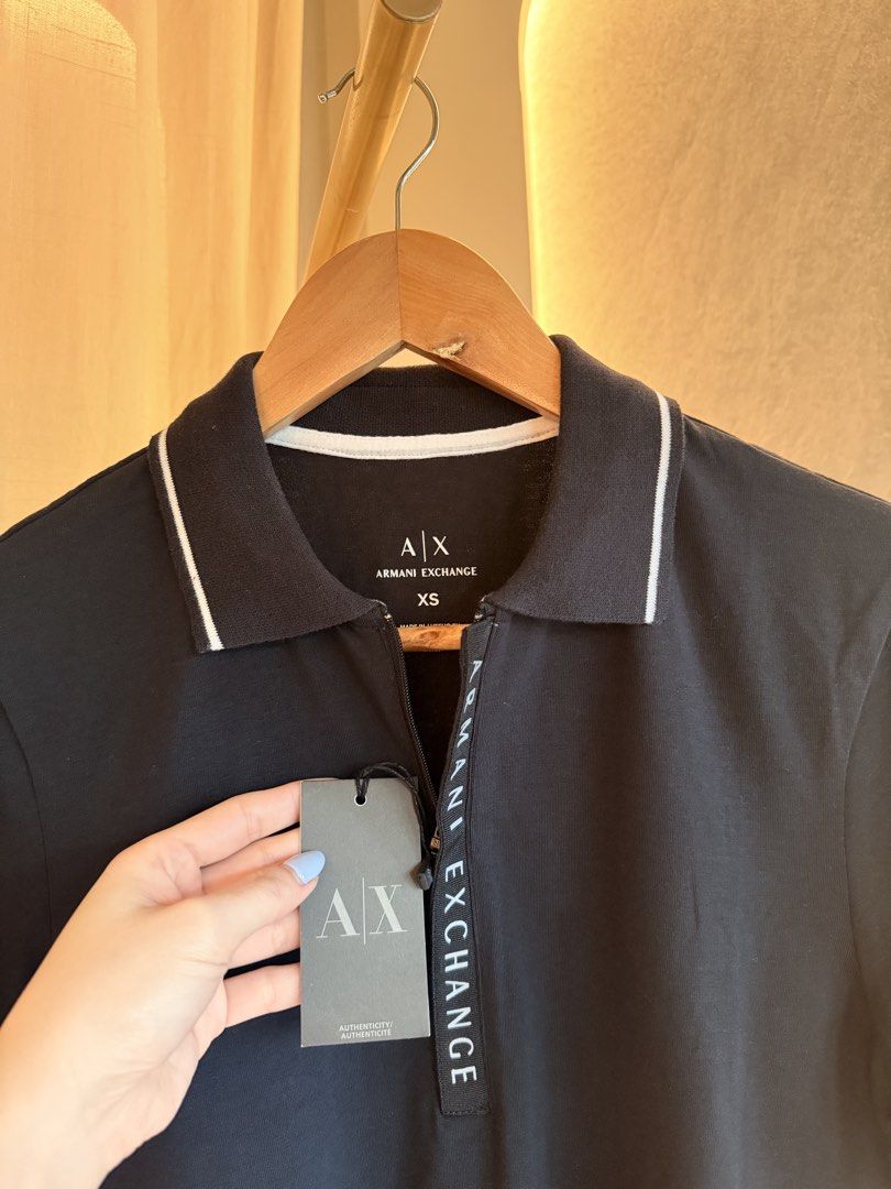 Armani Exchange Short sleeve half zip polo BNEW (Category: Community) located in Taytay. Submitted by chloweann (Listing ID 1470826758, Image 2). Description: Brand: Armani Exchange Size: Small UNUSED .