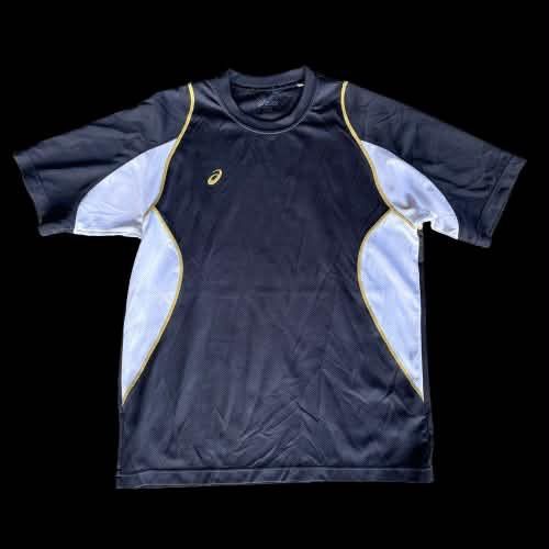 Asics black/white/gold running tee (Category: Activewear) located in Caloocan City. Submitted by landcruiser76__ (Listing ID 1470779075, Image 1). Description: - Brand: Asics - Colorway: Black and white with gold piping accents - Material: Breathable mesh fabric - Design: Short sleeves, crew neck, small embroidered Asics logo on the right chest - Fit: Standard athletic fit - Best for: Running, gym workouts, or casual wear Condition : good condish