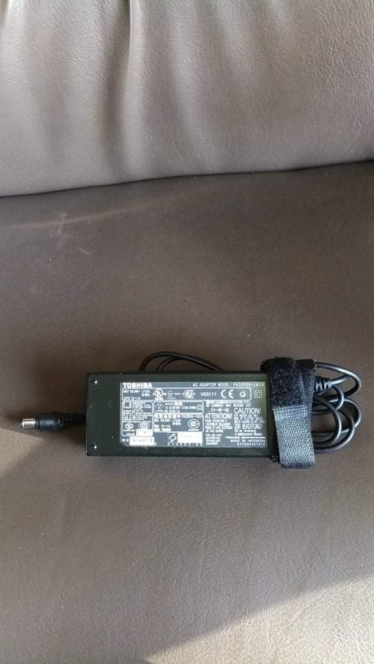 Assorted Adapter Power Supply Charger (Category: Chargers) located in Taguig. Submitted by grandfish_55ab5c (Listing ID 1470930026, Image 2). Description: Assorted adapter - Brand: Genuine Dell AC Adapter - Model: HA65NS1-00 - Power Output: 65W (19.5V / 3.34A) - Input: 100-240V (Universal/Global use) - Condition: Tested, 100% working, normal wear on casing - Inclusions: Power brick with attached cables and plug - Compatibility: Works with select 