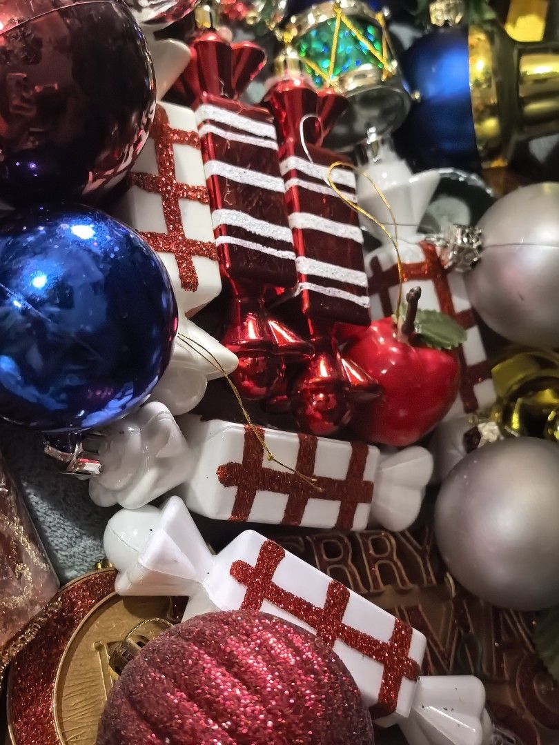 Assorted Christmas tree ornaments and decorations bulk bundle (Category: Vintage Collectibles) located in Rizal. Submitted by gkstcenit (Listing ID 1470862094, Image 2). Description: - Large holiday decoration bundle for your Christmas tree - Includes shiny glass baubles in red, blue, silver, purple, and orange - Features miniature drums, wrapped gift boxes, and candy-shaped ornaments - Comes with a small twig wreath accented with artificial holl