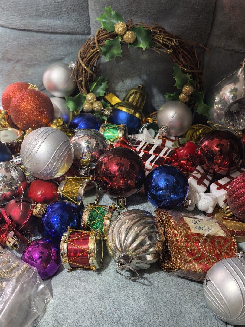 Assorted Christmas tree ornaments and decorations bulk bundle (Category: Vintage Collectibles) located in Rizal. Submitted by gkstcenit (Listing ID 1470862094, Image 3). Description: - Large holiday decoration bundle for your Christmas tree - Includes shiny glass baubles in red, blue, silver, purple, and orange - Features miniature drums, wrapped gift boxes, and candy-shaped ornaments - Comes with a small twig wreath accented with artificial holl