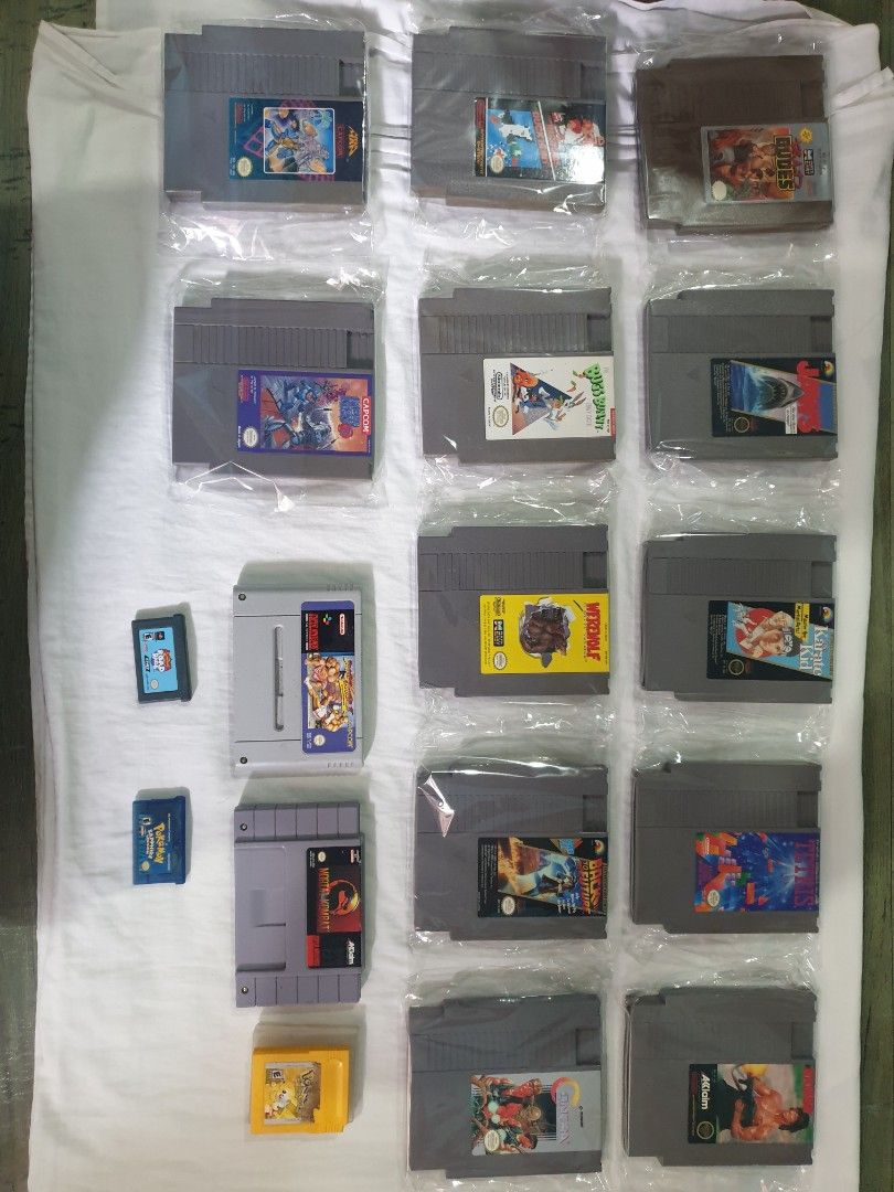 VINTAGE assorted nintendo cartridges for bundle set only (Category: Nintendo) located in Manila. Submitted by gentlecook01862 (Listing ID 1470751220, Image 1). Description: - Bundle includes retro game cartridges for NES, Super Nintendo, Game Boy, and Game Boy Advance - Features iconic titles: grail first edition of megan 1, megaman 3, Contra, Super Mario Bros, Pokémon Sapphire, pokemon pikachu edition and Mortal Kombat - Cartridges are loose and