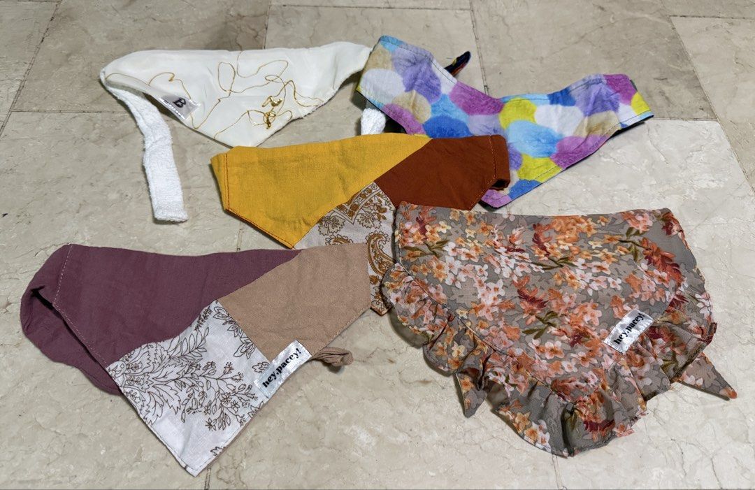 Assorted Pet Bandanas (Category: Homes & Other Pet Accessories) located in Manila. Submitted by db_collective (Listing ID 1470795384, Image 2). Description: - Bundle of pet bandanas in various designs, colors, and textures like plaid, floral, denim, velvet, and fringe. - Selling as a bundle (15 pcs) - See last 3 photos for reference 🔴 Lexi not included 🤭.