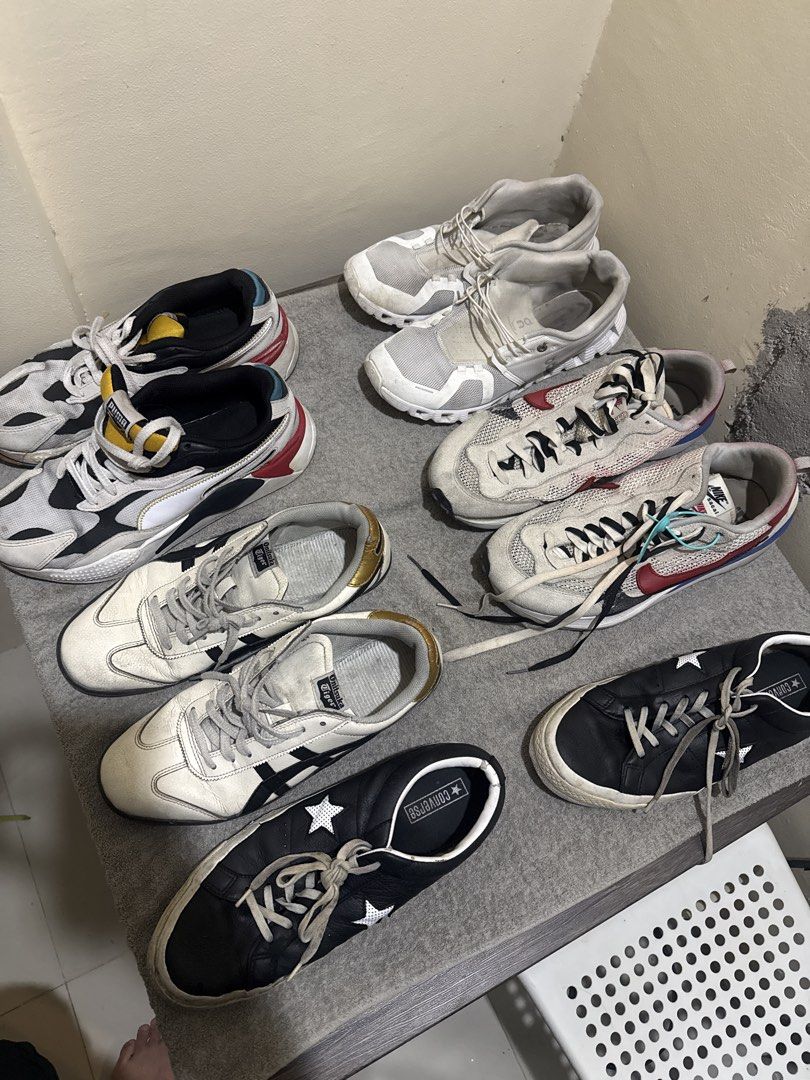 Assorted Sneakers Collection Puma Onitsuka Tiger Nike Converse (Category: Sneakers) located in Calamba. Submitted by xacalixa (Listing ID 1470840705, Image 1). Description: - Available sneakers: Puma chunky runners, Onitsuka Tiger low-tops, Nike Sacai style mesh kicks, and black Converse with star details - Color options: White, black, and multi-color pairs - Condition: Normal signs of wear on soles and uppers - Ideal for everyday casual rotation