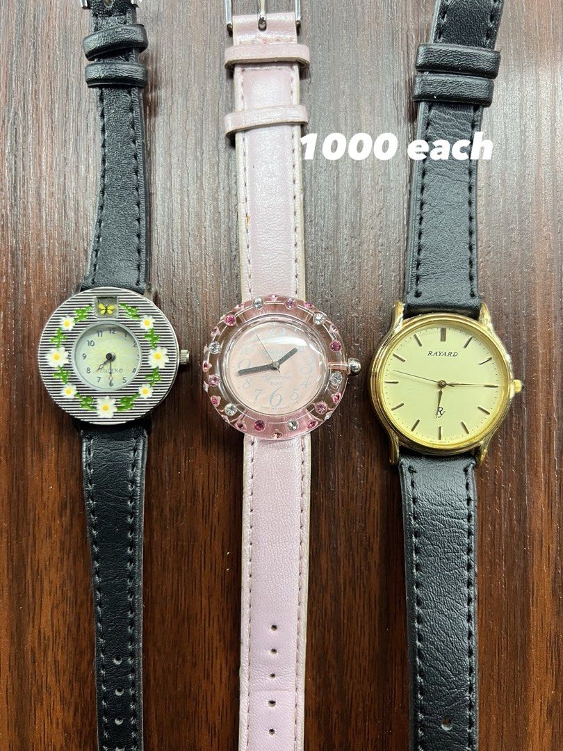 Assorted Vintage Watches (Category: Women's Watches) located in Manila. Submitted by l4ncedeleon (Listing ID 1470837944, Image 3). Description: - Pre-owned wristwatches available for individual purchase or as a set - Brands include: Jaxis, Kabana, Q&Q, Klon, Sportime, Current, Lucero, Rayard, Kenneth Cole, Aureole, and Sun Flame - Strap styles: Metal bracelets, black leather, textured leather, and pink leather - Dial colors: Black, white, red, go
