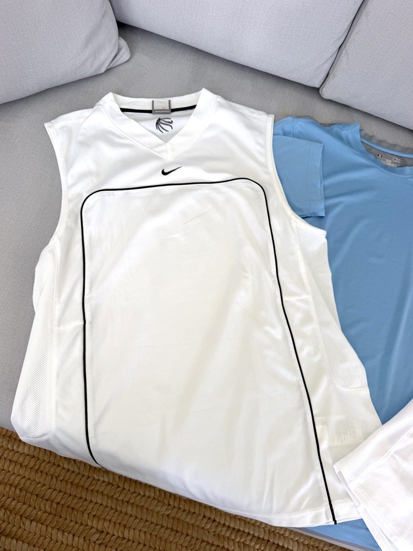 Athletic Shirts Bundle: Nike and Under Armour Size L M S (Category: Activewear) located in Lipa City. Submitted by pauline0303 (Listing ID 1470804621, Image 2). Description: - Brand: Nike & Under Armour - Items: 3 athletic tops (1 sleeveless jersey, 1 crew neck, 1 short-sleeve tee) - Sizes: Large (Nike), Small (UA), and standard sizing - Material: Lightweight, breathable fabric with mesh ventilation panels, dri fit - Condition: Like New.