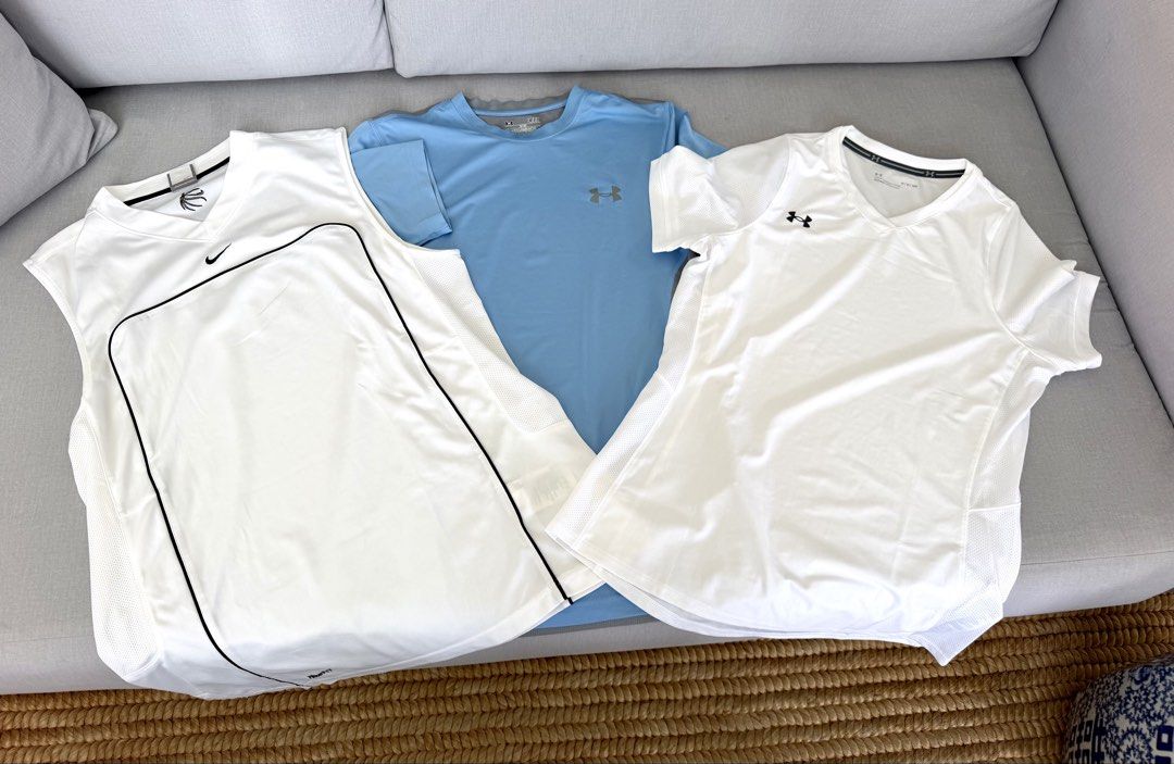 Athletic Shirts Bundle: Nike and Under Armour Size L M S (Category: Activewear) located in Lipa City. Submitted by pauline0303 (Listing ID 1470804621, Image 1). Description: - Brand: Nike & Under Armour - Items: 3 athletic tops (1 sleeveless jersey, 1 crew neck, 1 short-sleeve tee) - Sizes: Large (Nike), Small (UA), and standard sizing - Material: Lightweight, breathable fabric with mesh ventilation panels, dri fit - Condition: Like New.