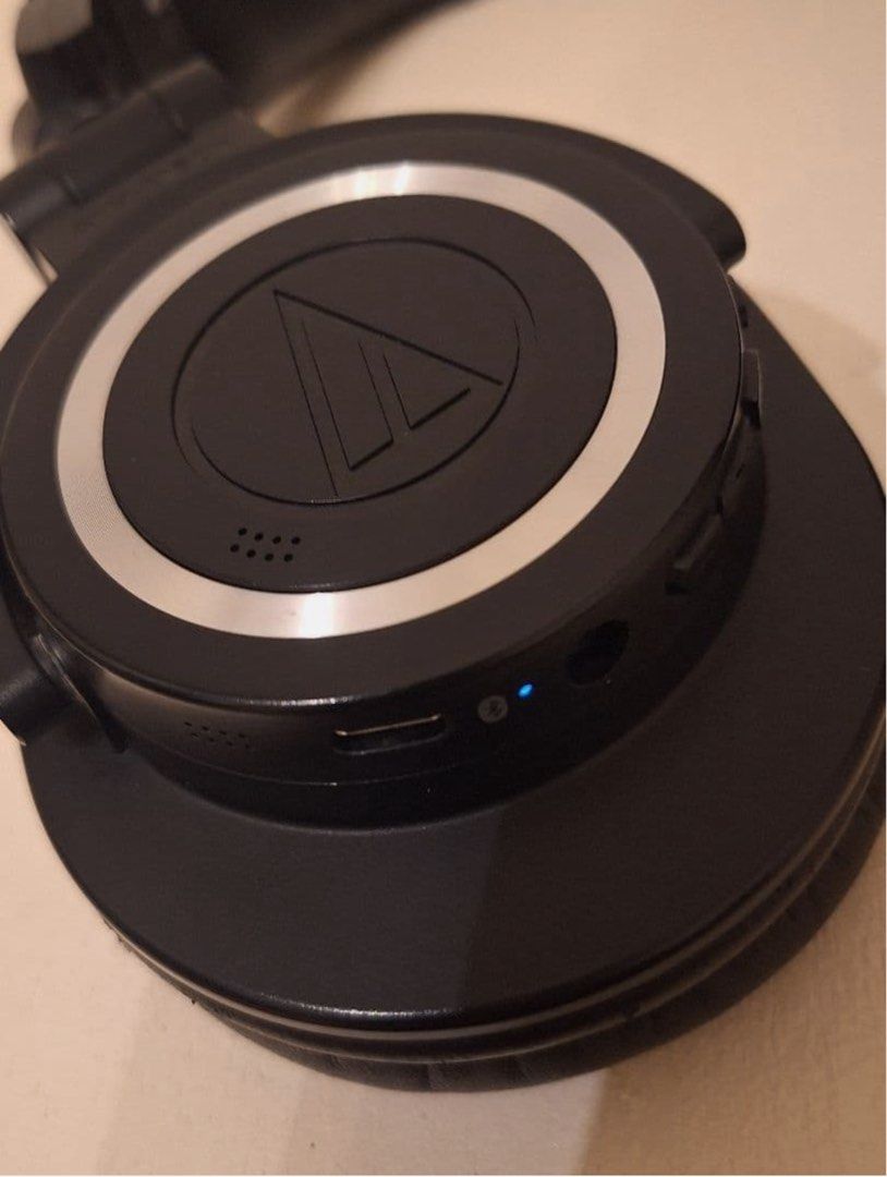 Audio-Technica ATH-M50xBT Wireless Over-Ear Headphones (Category: Headphones & Headsets) located in Quezon City. Submitted by annabananabread12 (Listing ID 1470784367, Image 2). Description: RFS: decluttering! Audio is perfect. Visible wear and tear around the headband as seen in photo. - Model: Audio-Technica ATH-M50xBT Over-Ear Headphones (Black) - Features: Bluetooth wireless, foldable design, and 90-degree swiveling earcups - Condition: Works