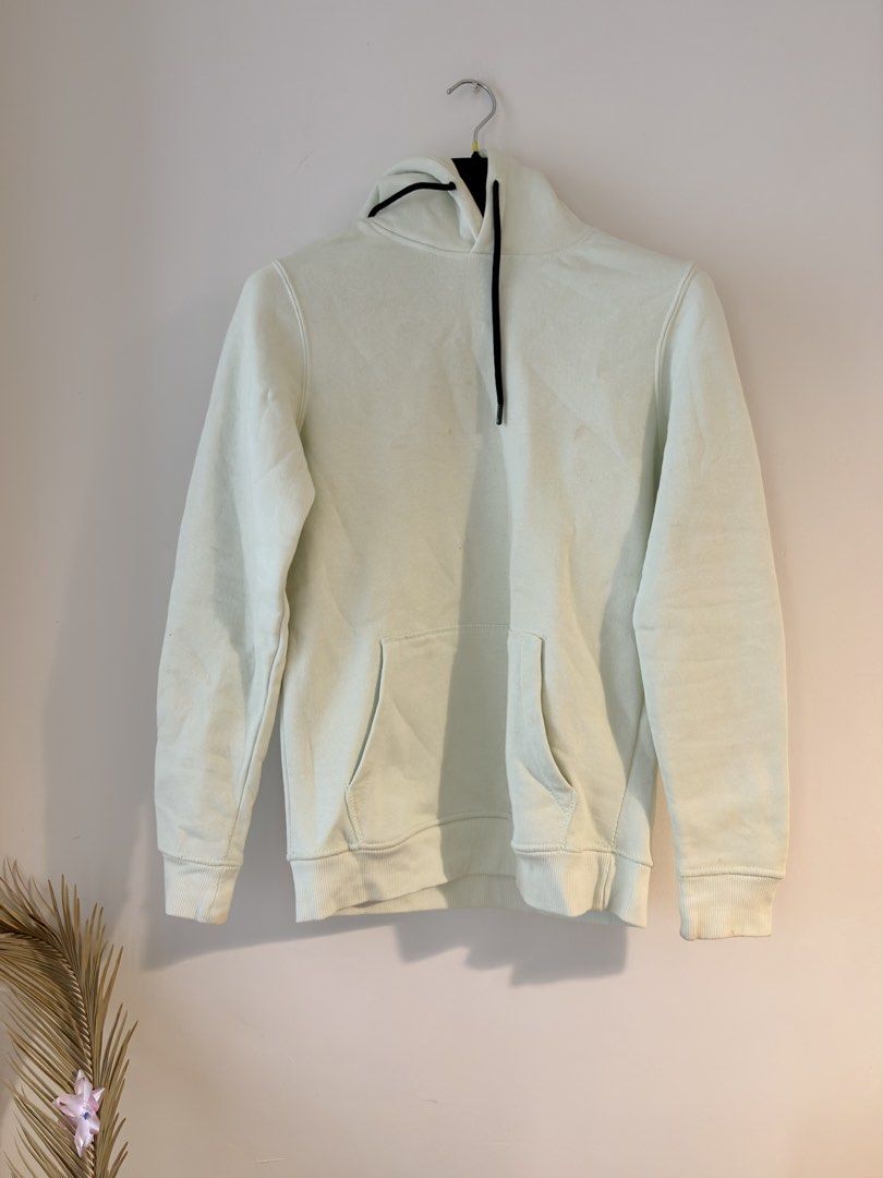 Authentic Bershka Mint Green Hoodie Pullover (Category: Hoodies) located in Mandaluyong City. Submitted by material_boi (Listing ID 1470775698, Image 1). Description: Store bought. Used less than 5 times. Made in Pakistan.Color is like mint green or pistachio green. Size XS on tag approx 19 inches wide and 26 inches long. Front kangaroo pocket, matching black drawstrings, and ribbed cuffs and hem. Small L1K3 text detail printed on the hood. Perfe