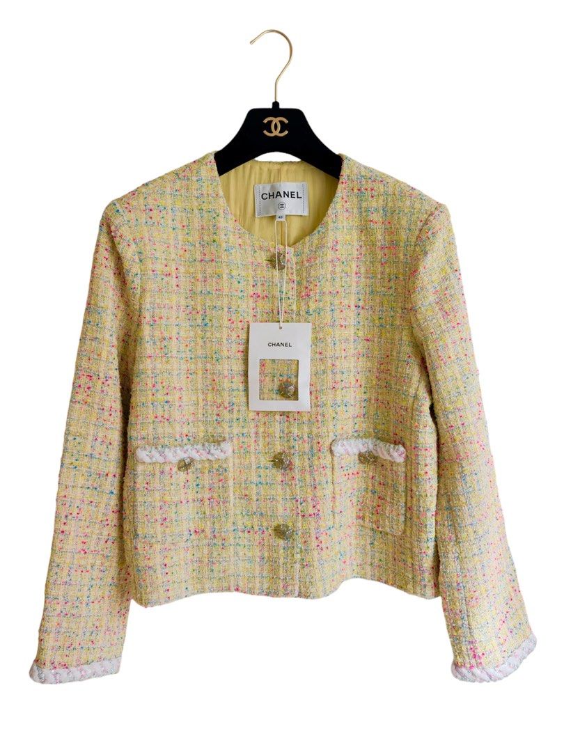 Authentic CHANEL 24C Tweed Runway Jacket (Category: Luxury Apparel) located in Manila. Submitted by serendipitymanila (Listing ID 1470645643, Image 1). Description: - Brand: Authentic Chanel Runway Tweed Jacket - Color: Bright yellow with multicolour flecks and vibrant yellow silk lining - Details: Sparkling crystal rhinestone buttons on front, pockets, and sleeve cuffs with elegant braided trim - Condition: Pristine, runway collector's item.