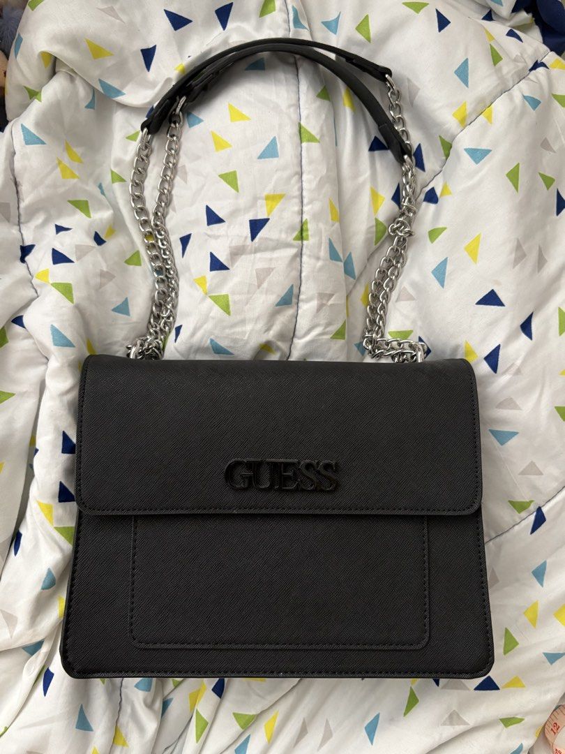 Authentic Guess Black Two-Way Shoulder/Crossbody Bag (Category: Shoulder Bags) located in Marikina City. Submitted by rasha.d.s (Listing ID 1470805758, Image 1). Description: — store bought, guaranteed authentic — used once, like new — medium-sized with 4 inner pockets, can fit a lot (can pm for photos of exact measurements) — two-way (crossbody or shoulder, adjustable strap length) 💰 MOP: Bank transfer to GoTyme only (No Gcash/COD) 📦 MOD: Gogo