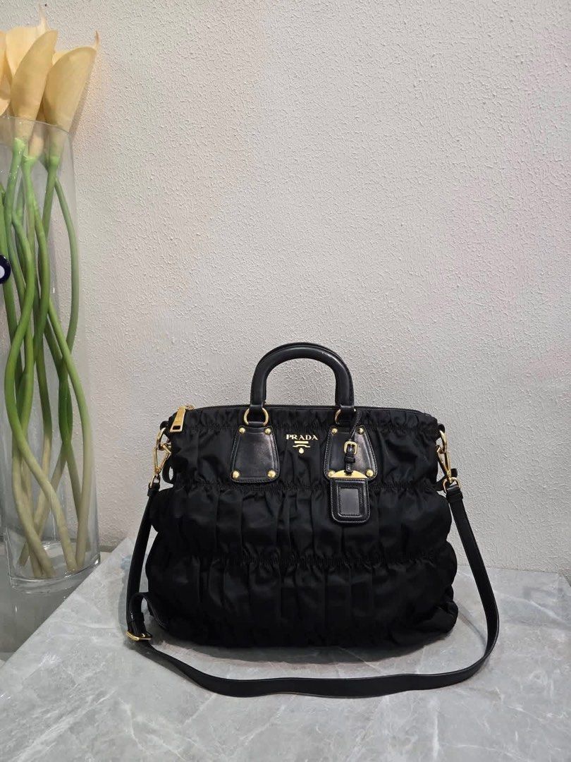 💯Authentic Prada Tessuto (Category: Luxury Bags & Wallets) located in General Santos City (Dadiangas). Submitted by braverabbit.67 (Listing ID 1470770244, Image 3). Description: - Authentic💯 - Pradah Tessuto Guafre Ruched Nylon Tote Bag 2-Way - Large size - In excellent condition💯✅.