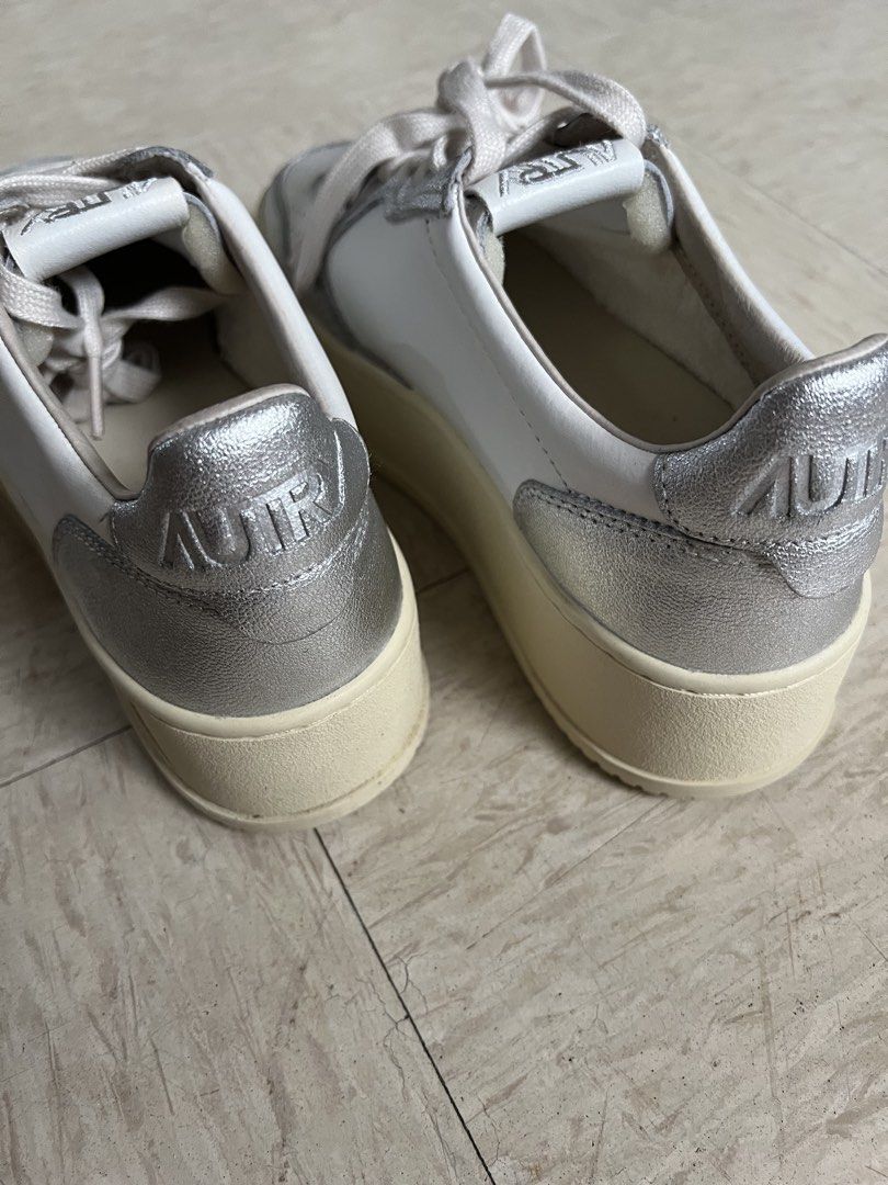 Autry Medalist Low Sneakers White Silver Size 40 (Category: Sneakers) located in Quezon City. Submitted by Zandee (Listing ID 1470807631, Image 3). Description: - Brand: Autry Medalist Low-Top Sneakers - Color: White leather with metallic silver trim and cream laces - Size: 40 (printed on insole) - Design: Vintage-style off-white midsole, perforated toe box, and iconic side logo with American flag - Condition: Excellent, minimal signs of wear on 