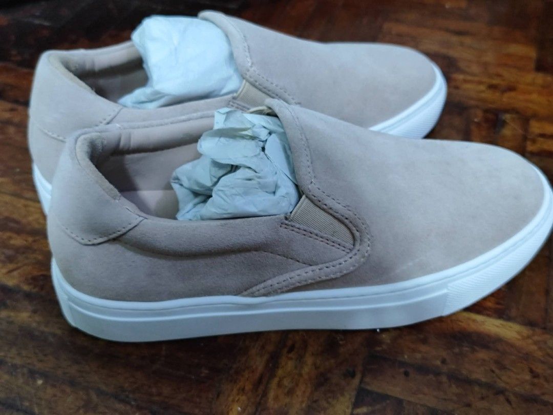 AVG Nude Suede Slip-On Sneakers (Category: Sneakers) located in Bacoor. Submitted by stargazer1084 (Listing ID 1470836922, Image 2). Description: Nude suede slip-on shoes with clean white rubber soles. Elastic side panels for easy on and off. Light pink insoles stamped with the AVG logo in gold lettering. Paper stuffing included inside to keep their shape..