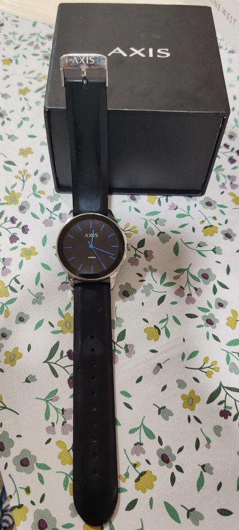 Axis H3194 Quartz Watch with Black Strap (Category: Men's Watches) located in Makati City. Submitted by plazatienda (Listing ID 1470751223, Image 2). Description: - Brand: Axis (Model: H3194) - Movement: Reliable Japanese quartz movement - Dial: Matte black with striking blue hour markers - Build: Stainless steel case back with 30M water resistance - Strap: Comfortable black silicone strap with buckle closure - Inclusion: Comes with original blac