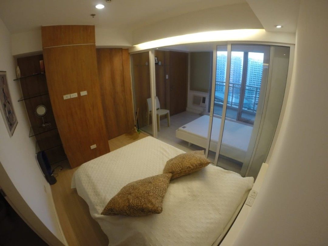Azure 2br with parking Php 10M (Category: Apartments & Condos) located in Quezon City. Submitted by sfrc2021 (Listing ID 1470746573, Image 3). Description: Azure Urban Resort Condominium for Sale Step into a bright, resort-inspired home in the heart of the city. This 60 sqm fully furnished unit blends generous space with calm, airy comfort. Property Details • Floor Area: 60 sqm • Bedrooms: 2 • Toilet & Bath: 2 • Balconies: 2 (perfect for morning 
