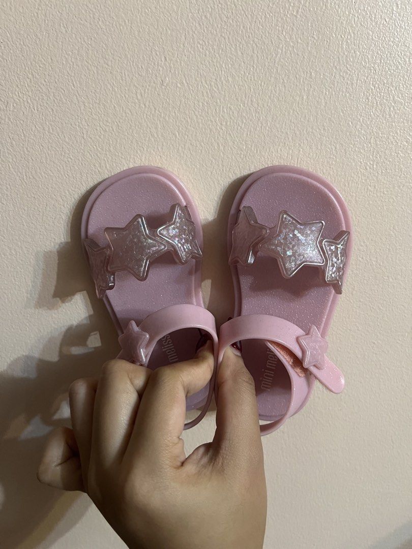 Babies Sandals (Category: Babies & Kids Fashion) located in Cebu City. Submitted by leighreina78606 (Listing ID 1470914848, Image 1). Description: Mini Melissa Pink Star glitter Sandals Size 7 (5.3 Inches) Cebu City.