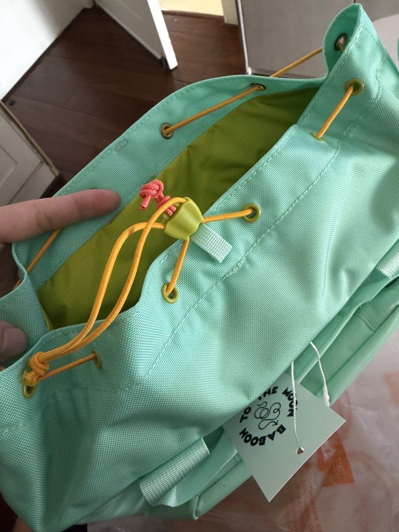 Baboon to the moon go tote bag (Category: Luxury Bags & Wallets) located in Quezon City. Submitted by shopping.eco (Listing ID 1470755978, Image 2). Description: Brandnew with tags Bought in the US Srp 6500 Color: aquadrift Replaced paracord, they shipped it to me with a missing cord. Works the same. QC.