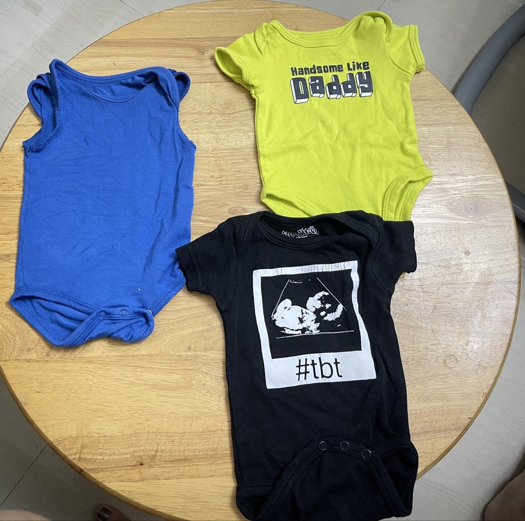 Baby Boy Onesie 0-3m (Category: Babies & Kids Fashion) located in Quezon City. Submitted by thefourcees (Listing ID 1470840408, Image 1). Description: - Bundle of 3 soft cotton baby rompers - Bright blue sleeveless bodysuit - Neon yellow short-sleeve bodysuit with 'Handsome Like Daddy' graphic - Black short-sleeve bodysuit with ultrasound scan photo and '#tbt' text print - Bottom snap closures for quick and easy diaper changes - Perfect for daily