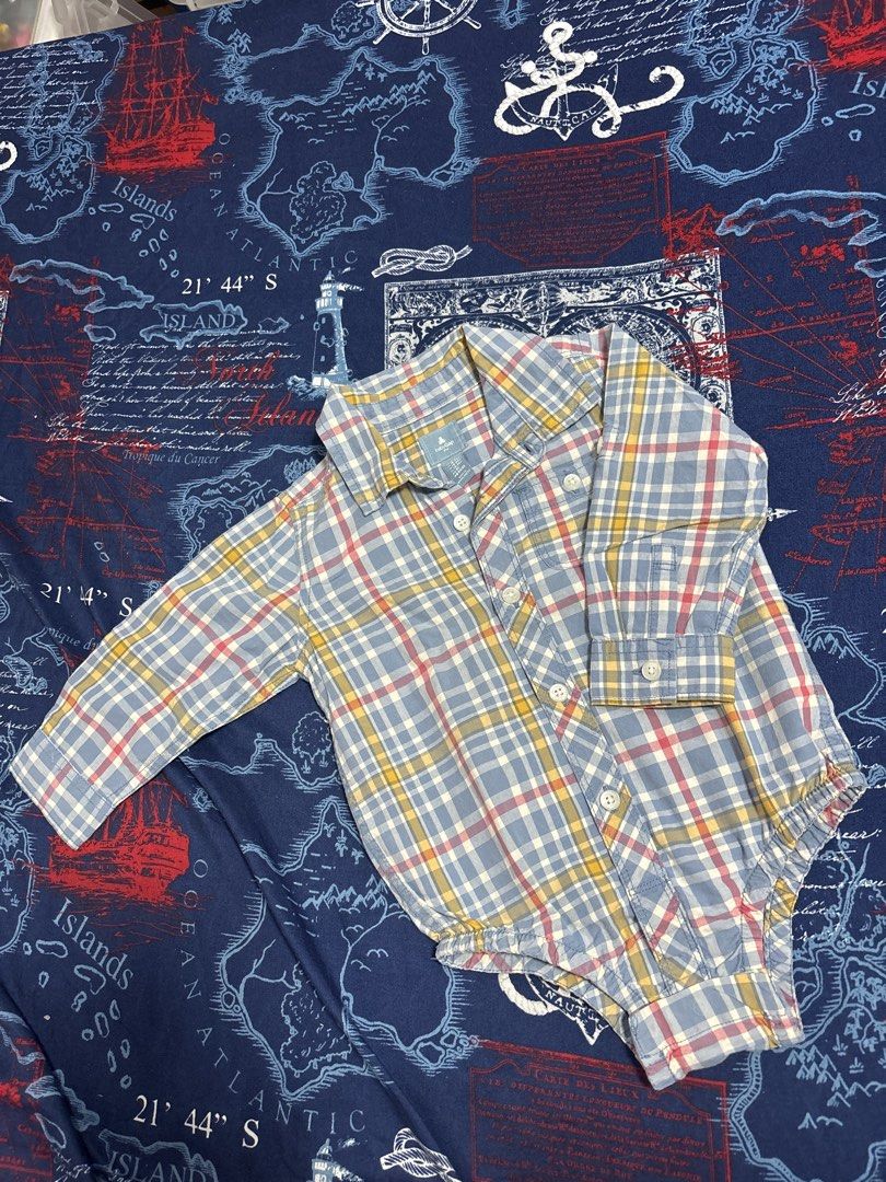 Baby Gap & Sonoma Baby Bodysuit Romper Bundle (Category: Babies & Kids Fashion) located in Quezon City. Submitted by iya_handovers (Listing ID 1470829421, Image 3). Description: - Set of 2 cute and comfortable long-sleeve baby rompers - Piece 1: Sonoma white bodysuit with all-over sports ball print (w/ removable stain) - Piece 2: Baby Gap blue plaid button-down collared shirt romper - Made with soft, baby-friendly cotton material - Convenient sna