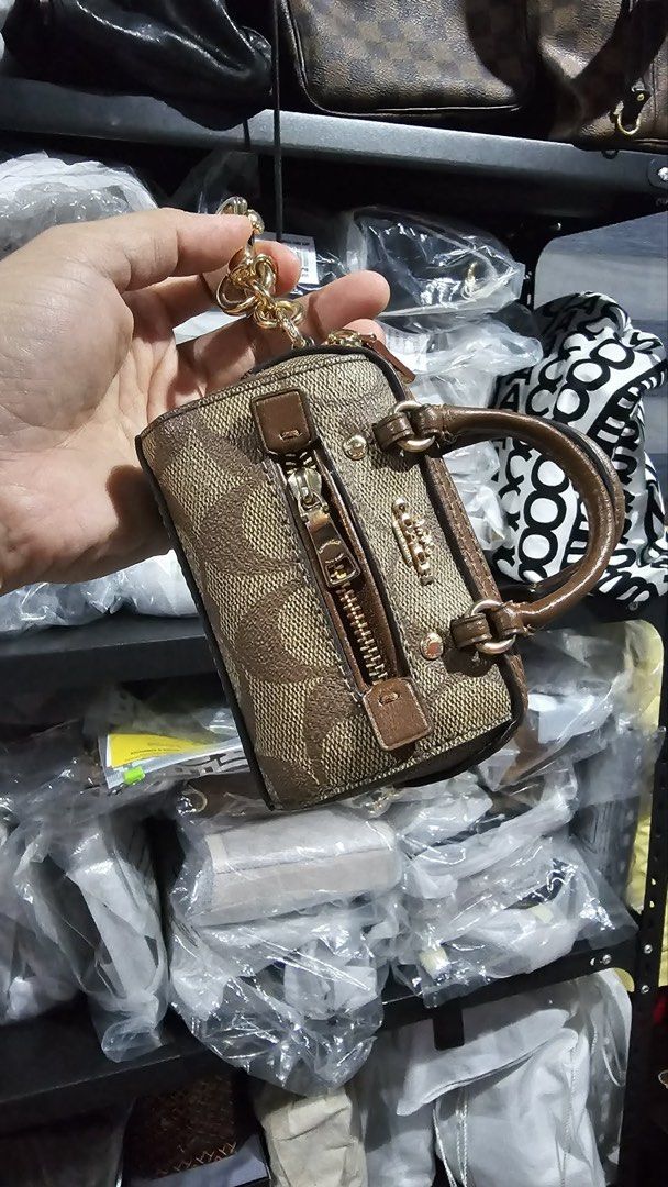 Bag charm/ card holder (Category: Luxury Accessories) located in Dasmarinas. Submitted by letssaleaway (Listing ID 1470841428, Image 1). Description: Preloved.