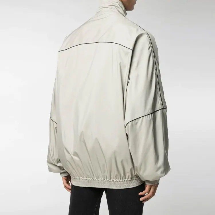 Balenciaga Nylon Zip Track Jacket Size 44 (Category: Coats, Jackets and Outerwear) located in Angeles City. Submitted by royal_vintage_thriftshop (Listing ID 1470827633, Image 1). Description: Oversize No issue Very good condition Chest 27, Total Length 28.
