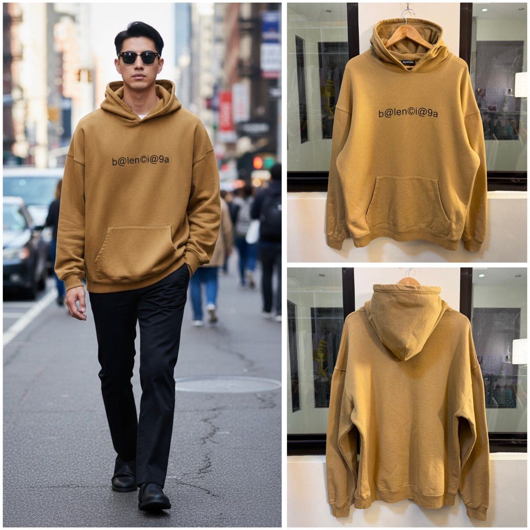 Balenciaga Pullover Hooded Sweatshirt (Category: Coats, Jackets and Outerwear) located in Paranaque City. Submitted by preluxeshop_ph (Listing ID 1470816809, Image 1). Description: Brand: Balenciaga •Style: Pullover Hooded Sweatshirt / Hoodie •Color: Camel / Desert Tan •Design Features: Black “b@lencỉ@g@“-style graphic text across the chest, attached hood, and front kangaroo pocket •Made In: Portugal •Condition: Pre-loved / Excellent condition.