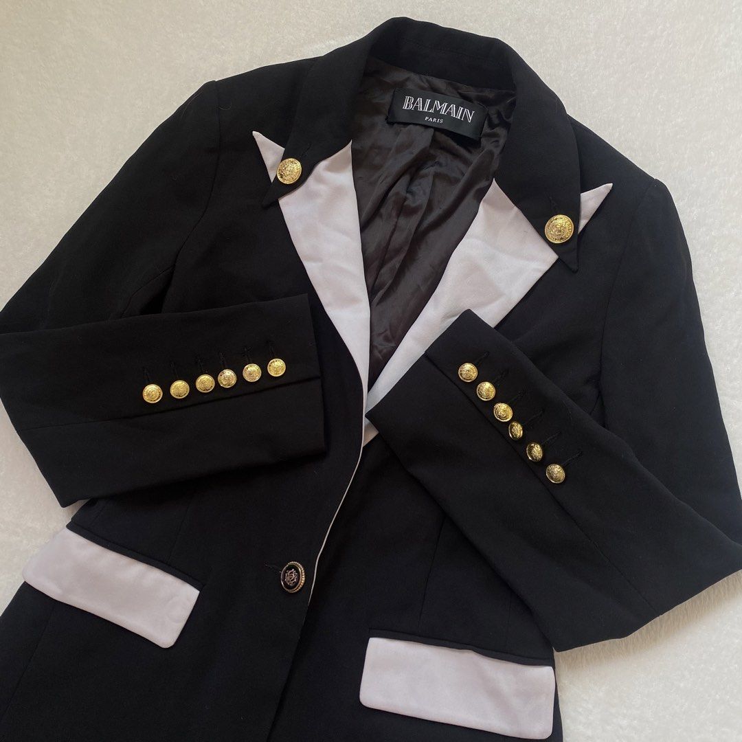 💫Balmain Black & White Long blazer (Category: Others Tops) located in Manila. Submitted by yourdaily_obsessions (Listing ID 1470803070, Image 3). Description: Item: Balmain Paris •Size: S-M •Measurements: Shoulder 15” Bust 34-36 Width 15.5” Length 28” •Gold buttons, working pockets. •Demure and sophisticated blazer top.✨🤍 Closure button is replaced. - Notes before making an offer❗️ •Photos are provided for self authentication. •Bogus/irresponsi