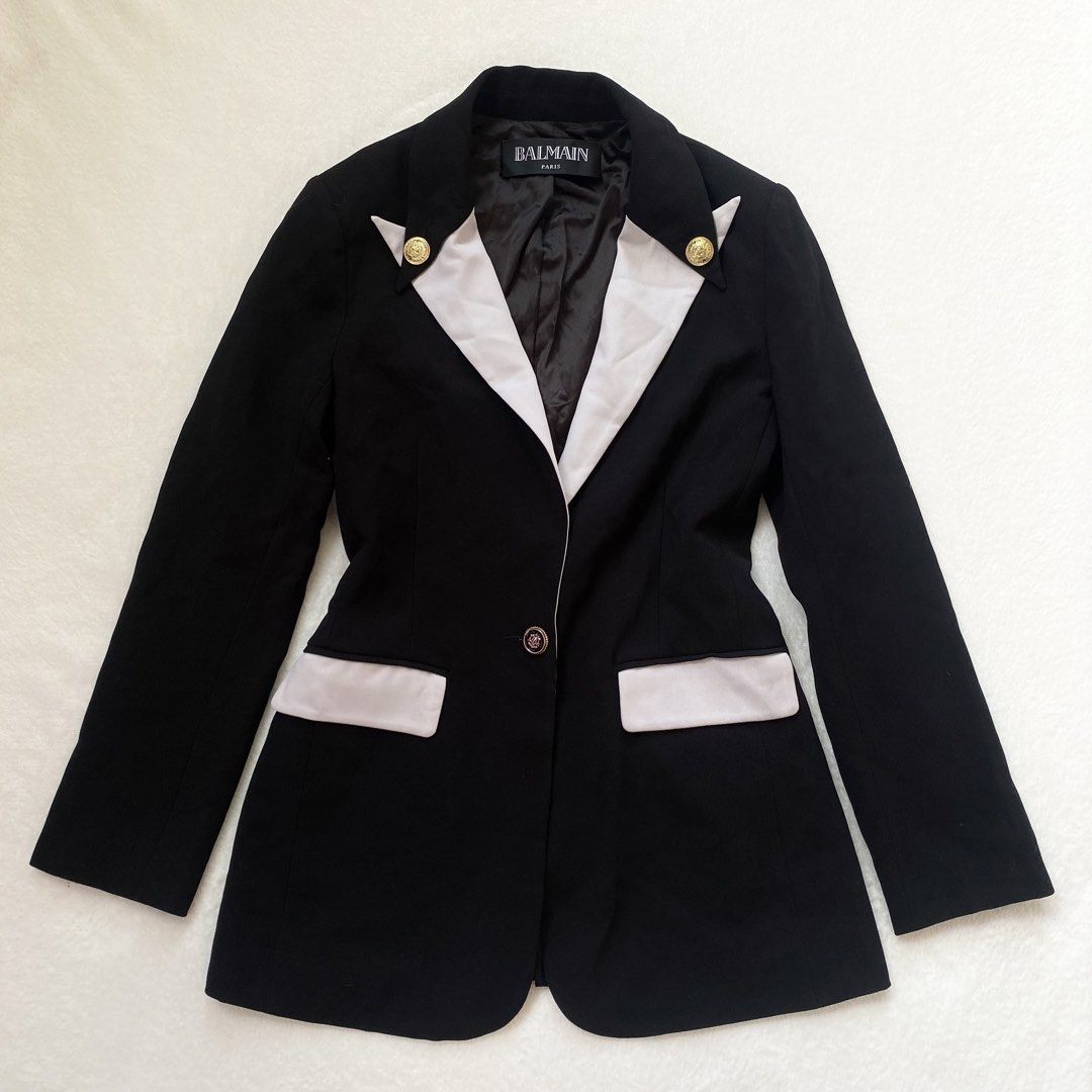 💫Balmain Black & White Long blazer (Category: Others Tops) located in Manila. Submitted by yourdaily_obsessions (Listing ID 1470803070, Image 2). Description: Item: Balmain Paris •Size: S-M •Measurements: Shoulder 15” Bust 34-36 Width 15.5” Length 28” •Gold buttons, working pockets. •Demure and sophisticated blazer top.✨🤍 Closure button is replaced. - Notes before making an offer❗️ •Photos are provided for self authentication. •Bogus/irresponsi