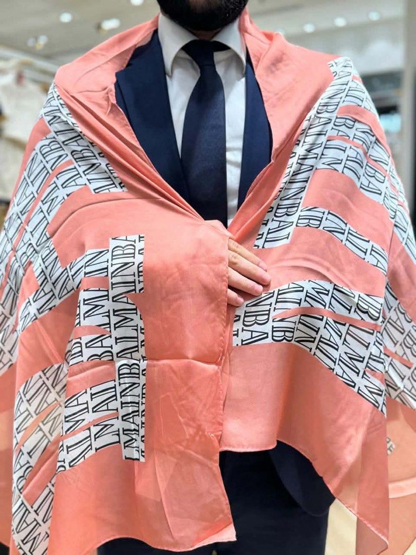 Balmain Pink Sheer Scarf (Category: Scarves) located in Muntinlupa City. Submitted by bagaholicmom (Listing ID 1470789670, Image 2). Description: 💯 AUTHENTIC Bnew with tags Comes with paperbag - Brand: Balmain - Color: Soft pink with bold black & white repeating text - Material: Lightweight, smooth fabric - Versatile: Easy to wear around the neck or drape over shoulders - Perfect effortless accessory to elevate any outfit .