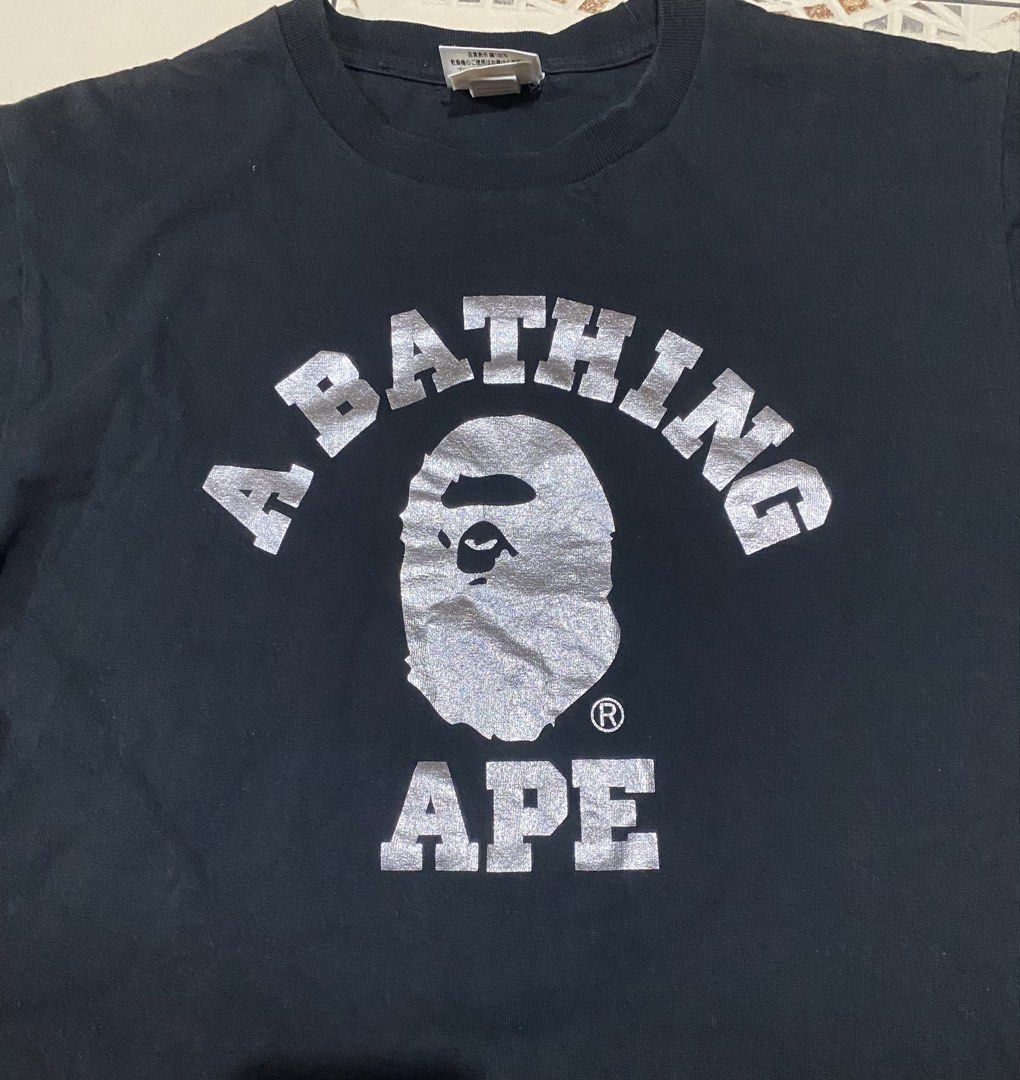 Bape College tee (Category: Tshirts & Polo Shirts ) located in Cebu City. Submitted by hustler_69 (Listing ID 1470855427, Image 2). Description: Bape college tee(authentic) Size medium 19.5 width 26.5 length Very good condition Issue 1 pinhole n line fade sa shoulder (Check last 2 pic) Details are all posted.