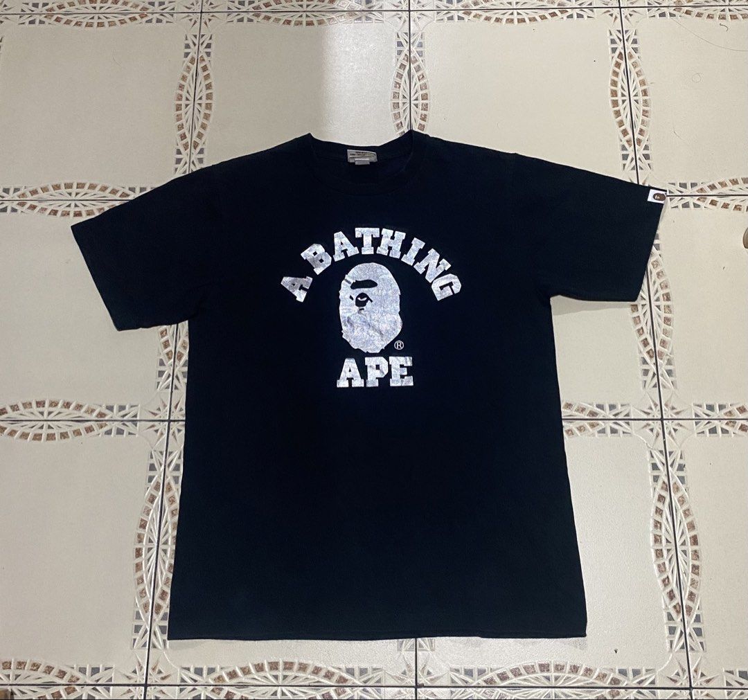 Bape College tee (Category: Tshirts & Polo Shirts ) located in Cebu City. Submitted by hustler_69 (Listing ID 1470855427, Image 1). Description: Bape college tee(authentic) Size medium 19.5 width 26.5 length Very good condition Issue 1 pinhole n line fade sa shoulder (Check last 2 pic) Details are all posted.