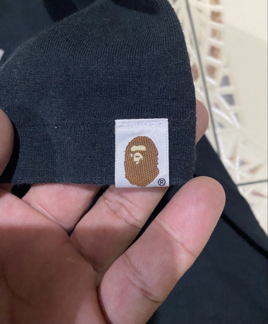 Bape College tee (Category: Tshirts & Polo Shirts ) located in Cebu City. Submitted by hustler_69 (Listing ID 1470855427, Image 3). Description: Bape college tee(authentic) Size medium 19.5 width 26.5 length Very good condition Issue 1 pinhole n line fade sa shoulder (Check last 2 pic) Details are all posted.
