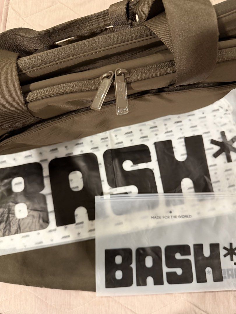 BASH Expedition Mini Weekender Mono in Terra (Category: Tote Bags) located in Imus. Submitted by yummyfinds (Listing ID 1470851022, Image 2). Description: Brand new, unused and kept only Originally bought for ₱2,650 - Brand: BASH - Color: Terra - Features: Sturdy top handles, dual zipper closure, and branded hardware - Storage: Spacious interior compartments for your daily essentials - Inclusions: Comes with original BASH dust bag and ziplock pac