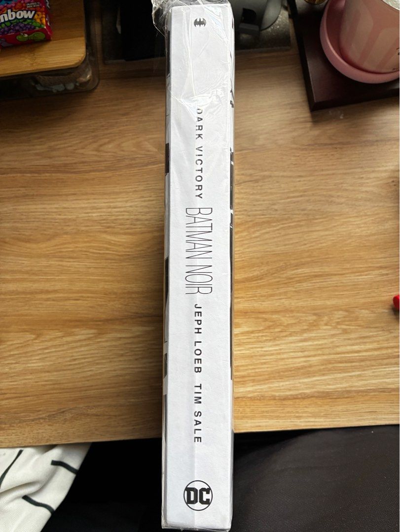 Batman Noir: Dark Victory Hardcover DC Comics (Category: Comics & Manga) located in Manila. Submitted by nikkoour (Listing ID 1470761274, Image 2). Description: - Title: Batman Noir: Dark Victory Hardcover - Creators: Jeph Loeb & Tim Sale - Publisher: DC Comics - Artwork: Presented in striking black and white - Condition: Brand new, still sealed in original plastic shrink wrap - ISBN: 978-1-4012-7106-0 - US Retail Price: $39.99.