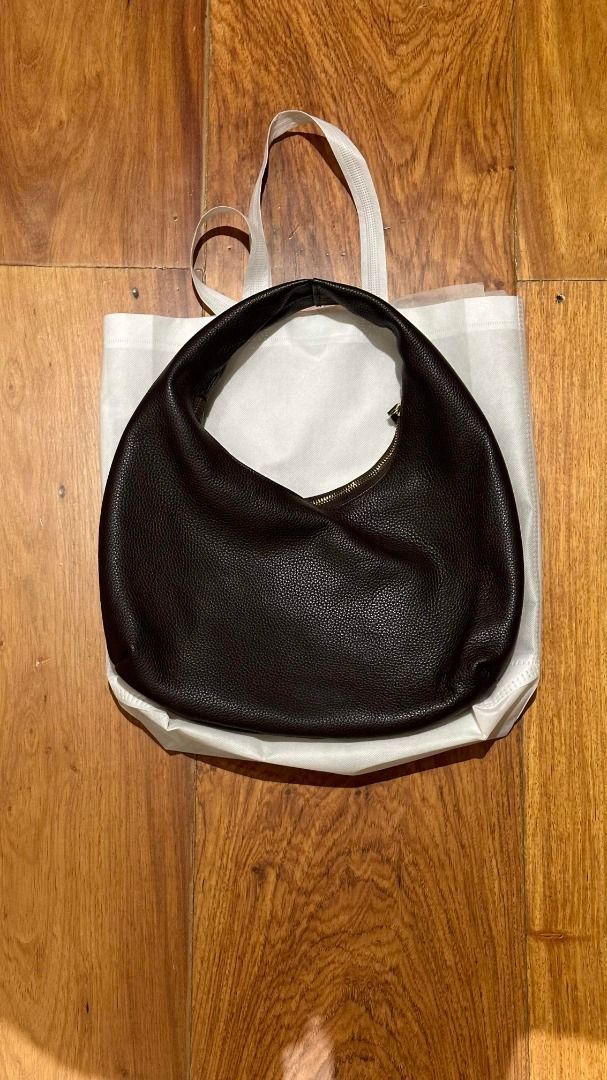 BBT Dark Brown Pebbled Leather Hobo Shoulder Bag (Category: Shoulder Bags) located in Mandaluyong City. Submitted by bakedzt (Listing ID 1470809770, Image 1). Description: Big Bag Theory Lulu Puffy Midi Hobo - Real leather (not faux/vegan) - Fully-lined with cotton fabric - Approx. 16" Height x 2.5" Depth x 13" Width. Approx. 8" Handle Drop. *Please expect creasings, markings, and texture/color variations natural to the leather material. They are