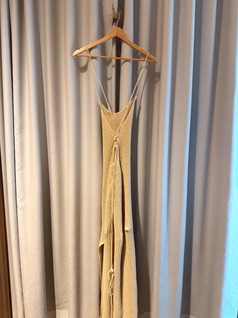 Beige Knit Backless Maxi Dress Beach Summer (Category: Dresses) located in Taguig. Submitted by regalbbb (Listing ID 1470755382, Image 2). Description: RFS: Decluttering Condition: Used once and no flaws. Shein sizes run big so this fits xs-s - Brand: FIRERIE - Color: Soft beige - Fabric: Textured anti-pilling waffle knit - Fit: Form-fitting silhouette with midi to maxi length - Design: Thin spaghetti straps and gorgeous lace-up open back - Featu