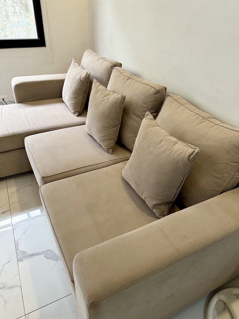 Beige L-shaped sectional sofa with matching throw pillows (Category: Sofas) located in Rizal. Submitted by mendellito (Listing ID 1470889750, Image 3). Description: Lindsay L-shape 3 Seat with Chaise Sofa Selling our pre-loved beige L-shaped sectional sofa with chaise, purchased from Mandaue Foam. ✨ Spacious and comfortable ✨ Includes throw pillows ✨ Perfect for living rooms and condos 🧼 Needs deep cleaning — selling as is. 💰 Price: 23,000 Orig
