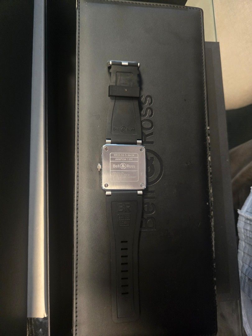 Bell & Ross BR03-92 (Category: Luxury Watches) located in Caloocan City. Submitted by binger705193752 (Listing ID 1470745020, Image 3). Description: Stainless Steel Golden Heritage Automatic 42mm Bezel Color Silver Case Color Silver Strap Rubber Black included military strap navy blue with original box and manual.