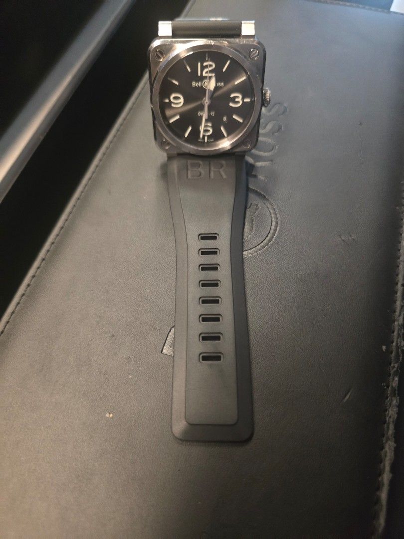 Bell & Ross BR03-92 (Category: Luxury Watches) located in Caloocan City. Submitted by binger705193752 (Listing ID 1470745020, Image 1). Description: Stainless Steel Golden Heritage Automatic 42mm Bezel Color Silver Case Color Silver Strap Rubber Black included military strap navy blue with original box and manual.
