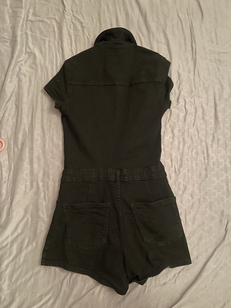 Bershka Black Denim Short Romper Size M (Category: Rompers) located in Manila. Submitted by azishops (Listing ID 1470848344, Image 2). Description: - Brand: Bershka, bought last yr in the MOA branch - Color: Black - Material: Denim - Closure: Front zip - Details: Collared neckline, short sleeves, 2 chest pockets, 2 back pockets, fitted waist with belt loops - Condition: Great pre-loved condition, worn twice - rfs: won't fit me anymore.