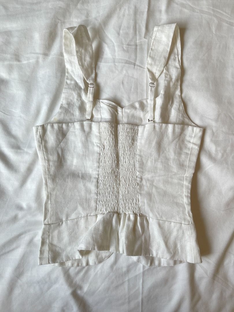 Beyond Collective 9-to-9 Top (Category: Sleeveless) located in Quezon City. Submitted by everythingmustgo__ (Listing ID 1470762857, Image 2). Description: Beyond Collective 9-to-9 Top - brand new no tags - size: small (bust 32-33.5 / waist 26-28 / length 18) - adjustable and detachable back straps - has little but unnoticeable stain due to storage (as seen on the 3rd photo) ‼️ firm with price. low ballers will not be entertained ‼️.