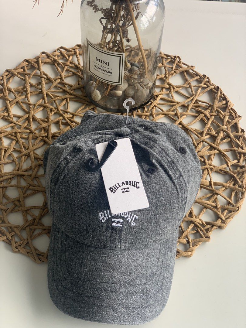 Billabong Peyote Washed Dad Cap Grey (Category: Caps & Hats) located in Quezon City. Submitted by angge1013 (Listing ID 1470782674, Image 1). Description: - Brand: Billabong - Style: Peyote washed dad cap - Color: Grey - Condition: Brand new, unworn with original tags attached - Details: Embroidered logo on the front - Fit: Adjustable strap in the back for a custom fit.