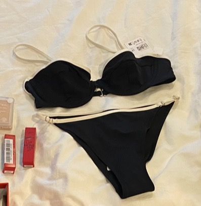 Black and white contrast trim bikini set (Category: Bikinis & Swimsuits) located in Caloocan City. Submitted by zaramndz (Listing ID 1470849391, Image 1). Description: - Brand new with tags attached - Color: Black with chic white contrast trim - Material: Premium ribbed textured fabric - Top: Underwire support with adjustable straps for a customized fit - Bottoms: Matching style featuring stylish side strap accents - Perfect for your next beach t