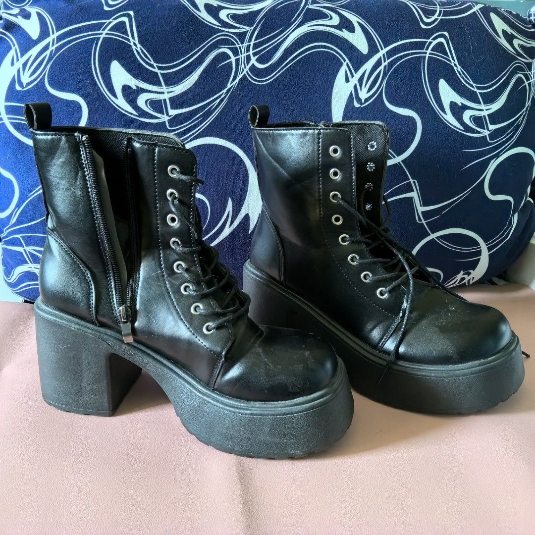 Black Chunky Platform Lace-Up Boots Size 40 (Category: Boots) located in Caloocan City. Submitted by thirfty.loved (Listing ID 1470886414, Image 1). Description: ‼️‼️ MUST READ ‼️‼️ Description: - Bought from tiktok (for christmas party) - Medyo matigas yung sole pero comfy kahit papaano - Style: Grunge / Punk / Alternative platform boots - Color: Black - Size: 40 (25cm) - Features: Lace-up front, side zippers, thick block heels, and lug soles - 