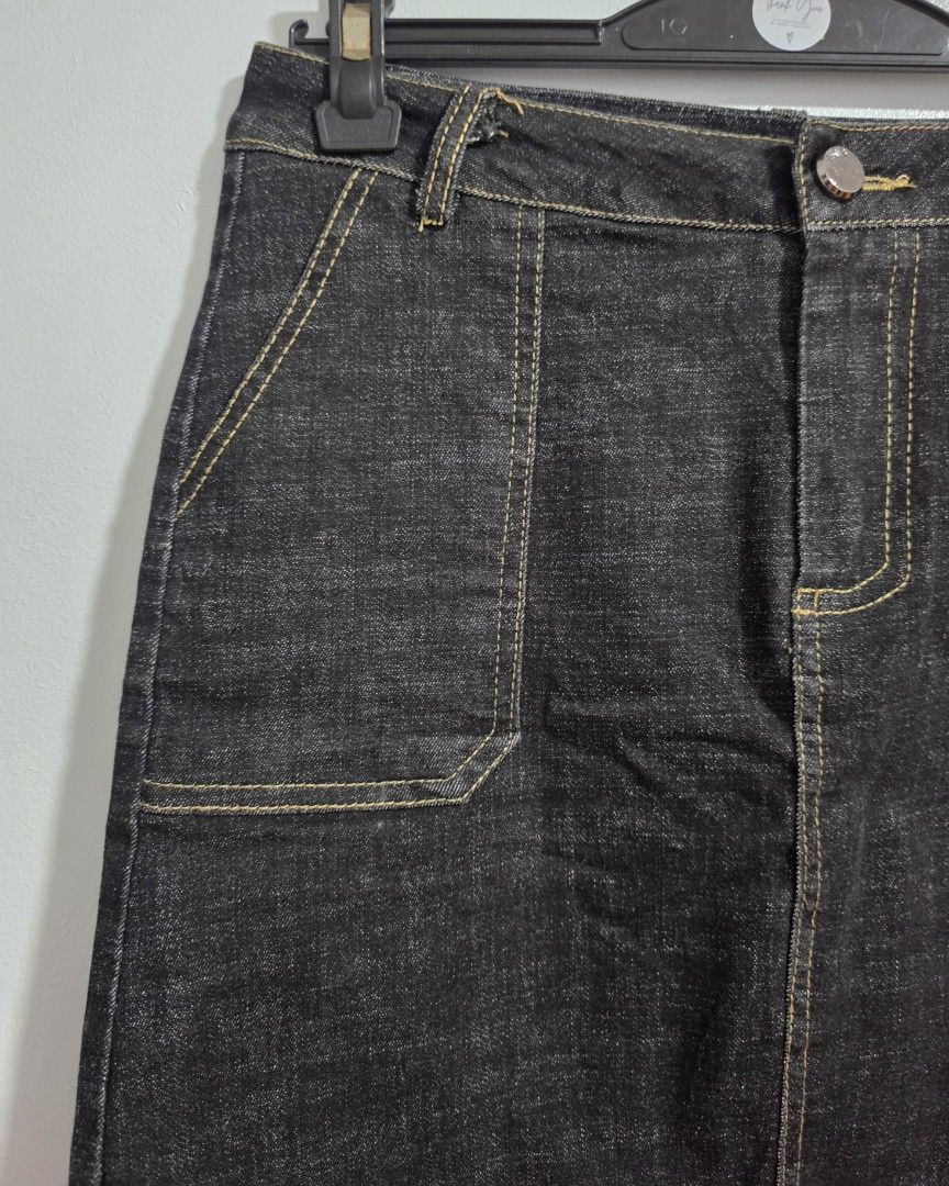 Black denim skort with built-in shorts (Category: Skirts) located in Paranaque City. Submitted by franinnashop (Listing ID 1470840363, Image 3). Description: Declutter -Dark wash black denim skirt with front patch pockets and contrast yellow stitching. -Includes built-in shorts underneath so you can move comfortably without worries. -Front button closure and faux back pockets. -Measurements: waist 26 to 28 inches, hips 32 inches, length 17 inches
