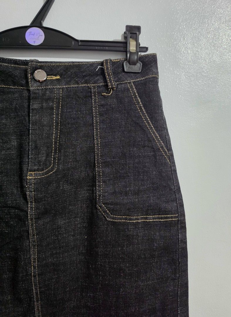 Black denim skort with built-in shorts (Category: Skirts) located in Paranaque City. Submitted by franinnashop (Listing ID 1470840363, Image 2). Description: Declutter -Dark wash black denim skirt with front patch pockets and contrast yellow stitching. -Includes built-in shorts underneath so you can move comfortably without worries. -Front button closure and faux back pockets. -Measurements: waist 26 to 28 inches, hips 32 inches, length 17 inches
